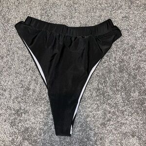 Women’s medium black bathing suit bottoms, good condition